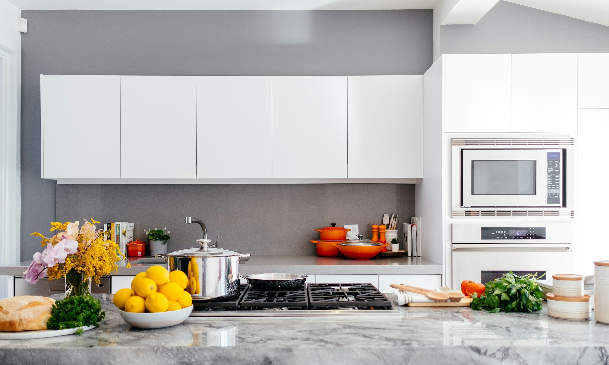Bright modern kitchen with cookware and utensils